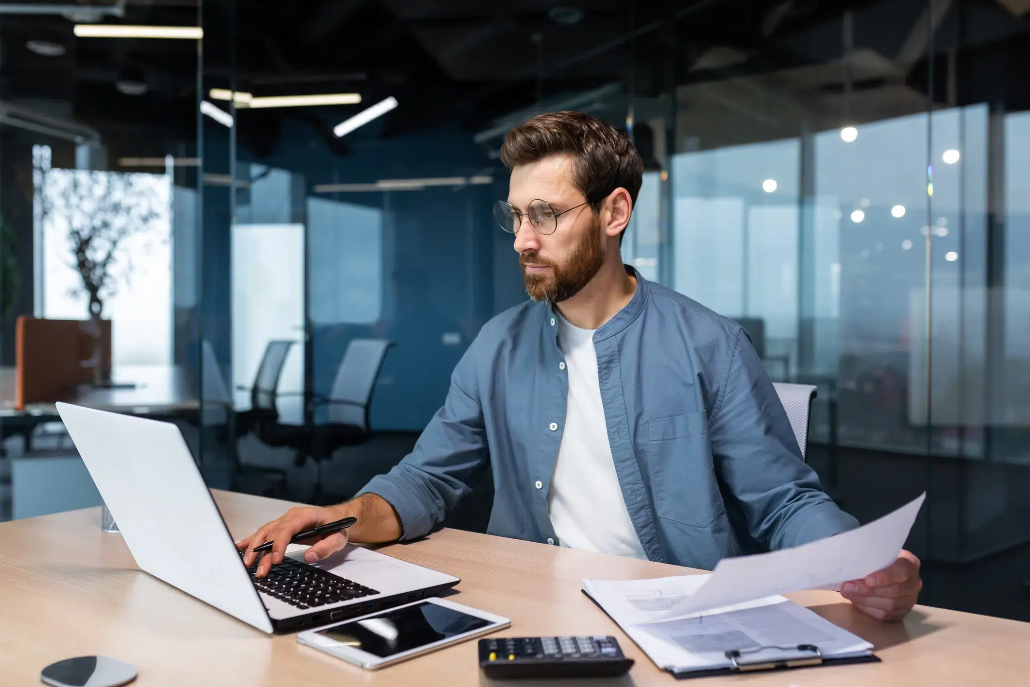 Employees engaging with an intranet on a shared screen